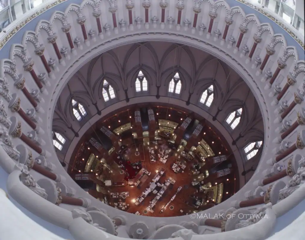 View of the interior dome of Malak of Ottawa mosque with intricate architectural details.