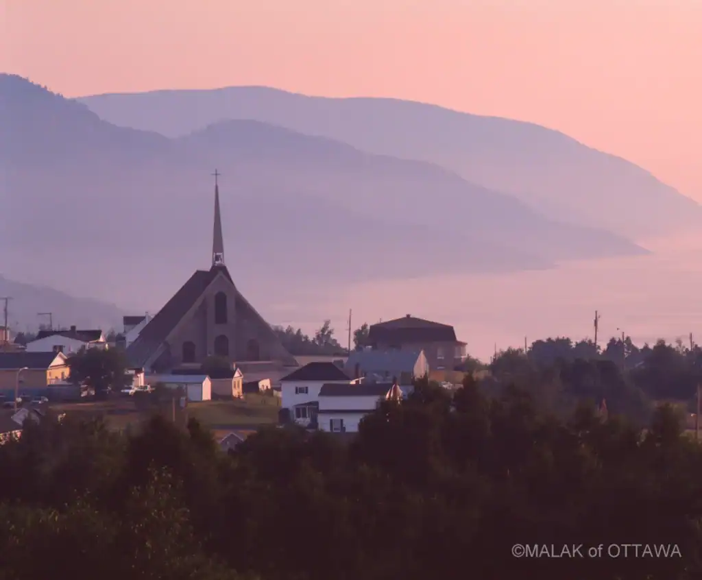 Church in Ottawa with scenic mountain background.