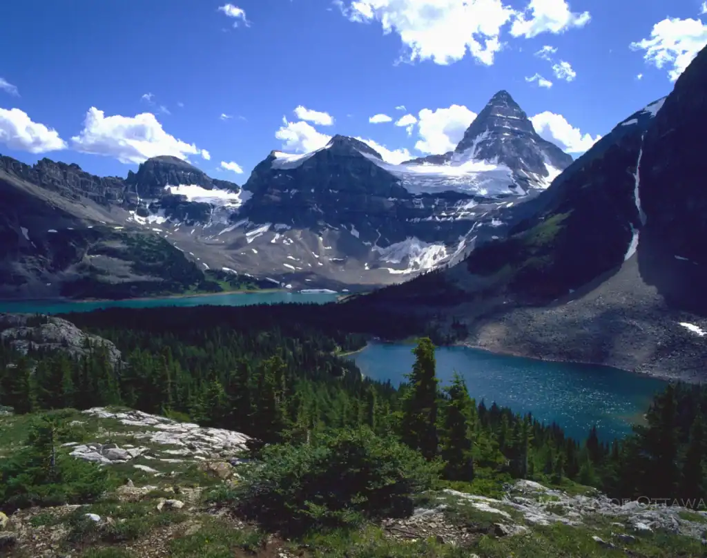 Majestic mountain scenery with snow-covered peaks and vibrant lakes in Banff.