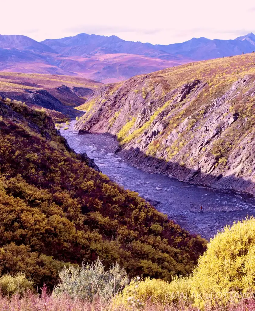 Beautiful river flowing through rugged mountain terrain in Ottawa.